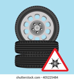 Vector illustration new, shiny winter car wheels and triangle road sign with snowflake. Stack of realistic car wheels. Cold warning