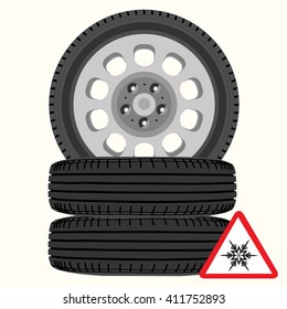 Vector illustration new, shiny winter car wheels and triangle road sign with snowflake. Stack of realistic car wheels. Cold warning