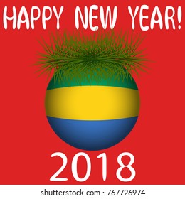 Vector illustration for the New Year 2018 with hand-drawn text "Happy New Year", Christmas tree decoration ball  painted in the colors of the flag of Gabon and a sprig of Christmas tree