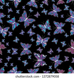 Vector illustration. Nice background for wrappers and wallpaper, design of fabric, paper. Seamless background of colorful butterflies. Cute butterflies on black, purple and blue.