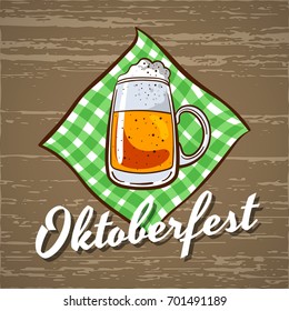 Vector illustration of Oktoberfest sign with beer on napkin on wooden background