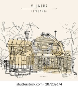 Vector illustration of an old house in Vilnius, Lithuania, Europe. Isolated freehand drawing. Travel sketch. Greeting card template. Postcard design with hand lettered title and space for text