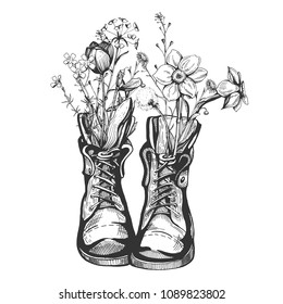 Vector illustration of an old vintage boots filled with wild field meadow flowers. Hiking inspiring, nature admiration design. Hand drawn engraving style.