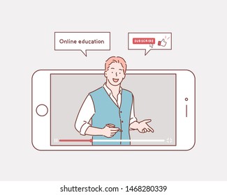 Vector illustration of online education. Concept of video blogging. The guy is in his video blog on the phone screen.  Hand drawn style vector design illustrations.