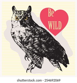 Vector illustration with owl looking forward and pink heard with text "Be wild". Graphic picture. T-shirt design