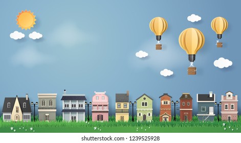 Vector Illustration. paper art of villa house with bulb balloon and blue sky.Paper art carving