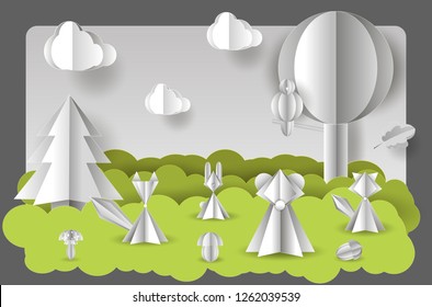 Vector illustration of paper cut with layers. Forest with wild animals, trees and mushrooms, Fluffy clouds with shadow on the sky.