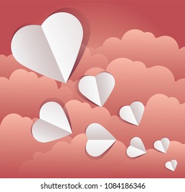 Vector illustration of paper cut out hearts with clouds, copy space, paper art design and craft style. Valentine's day concept. 