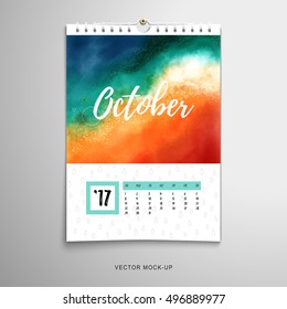 Vector illustration. Paper spiral calendar with watercolor pattern. Hand drawing with colored spots and blotches. Realistic shadows. Inscription - October. 