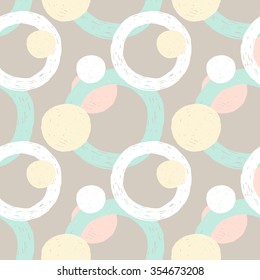 vector illustration pattern of pastel yellow, white, pink and turquoise hand drawn circles, on gray background