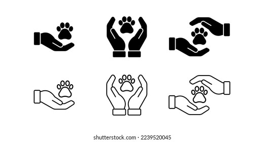 Vector illustration of Paw in hand icon set isolated