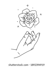 Vector illustration of peony flower over woman hand. Hand drawn line art style. Magic feminine design. Human arm with mystic plant and sturdust. Isolated on white background. Element for design.