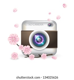 Vector illustration with photo camera and sakura flowers on white background