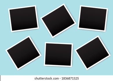 Vector illustration of photo frames. Old photographs on a blue wall. Black Photographs in white frames. Stock image.