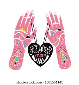 Vector illustration of pink human hands, black heart, pine trees, mountains, clouds and doodle elements. Go your own way - lettering and calligraphy inspiration quote. Typography poster, print design