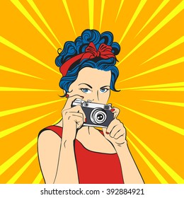 Vector illustration of pop art beautiful young woman. Retro Style. Photographer / Woman holding photographic camera.