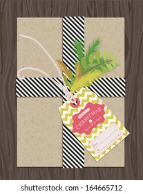 Vector Illustration Present Package Wrapped With Craft Paper And Rope With A Leaf And Gift Tag On Wooden Background