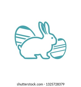 The vector illustration a rabbit sits a splitting off of two Easter eggs. Set of two vector icons. Easter symbol a rabbit and beautifully chiken eggs. Flat design