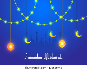 Vector illustration of Ramadan Kareem with shiny lamp.