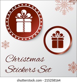 Vector illustration of Realistic Round Stickers or Icons. With peeled off corner and shadow. Red Christmas theme with gift box. EPS 10