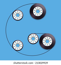 A vector illustration of a recordable babin of tape cassette. Letter G