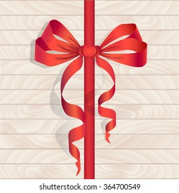 Vector illustration with red bow on a wooden background.