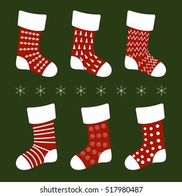 vector illustration red Christmas socks with different patterns on a green background