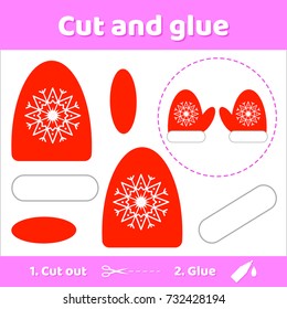Vector illustration. Red mittens with snowflake. Education paper game for preschool kids. Use scissors and glue to create the image.