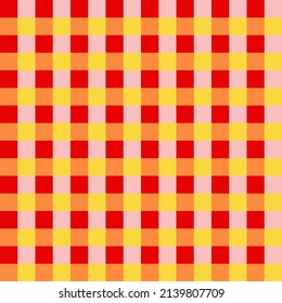 Vector illustration of red, orange and yellow checkered pattern design, small colored squares arranged within a large square.