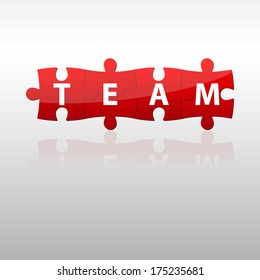 Vector illustration of red puzzles with writing "team". Reflection below main puzzles.