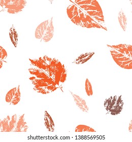 Vector illustration. A repeating seamless pattern. Isolated objects on white background. The imprint of the leaves. Colored silhouettes of leaves.