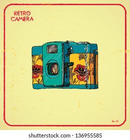 Vector illustration of an retro camera.