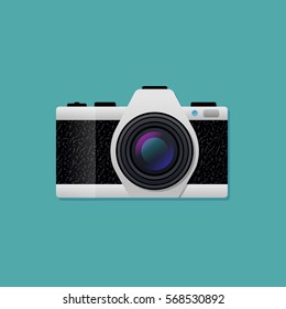 Vector illustration of a retro camera in a flat style.