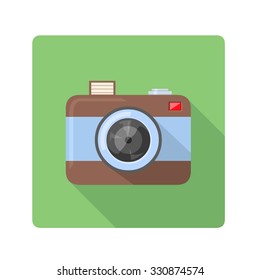 A vector illustration of a retro camera Icon.
Flat Icon Camera illustration.
Vintage camera with flash and lens.