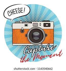 Vector illustration of a retro photo camera in a pop art style. Vintage photo camera icon. Capture the moment text.