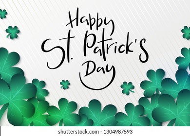 Vector illustration of saint patricks day greetings banner template with hand lettering label - happy st. patrick's day- with realistic clover leaves.