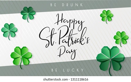 Vector illustration of saint patricks day greetings banner template with hand lettering label - happy st. patrick's day- with paper origami clover leaves.