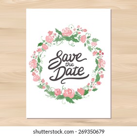 Vector illustration - Save the date wedding invitation with watercolor flowers and hand drawn lettering. Card template on a wooden background