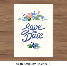 Vector illustration - Save the date wedding invitation with watercolor flowers and hand drawn lettering. Card template on a wooden background