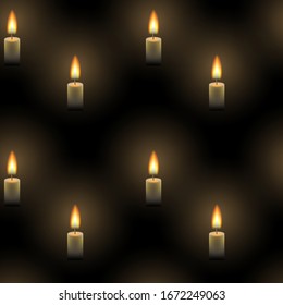Imagen vectorial de un fondo sin fisuras de velas ardiendo en la oscuridad, la mística luz de llama