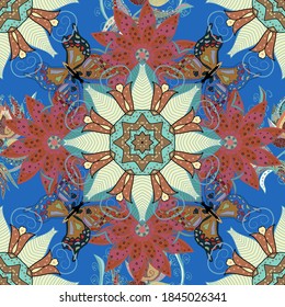 Vector illustration. Seamless background of colorful butterflies. Decor on beige, blue and pink background for clothing design.