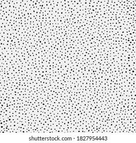 Vector illustration of seamless black dot pattern with different grunge effect rounded spots isolated on white background.