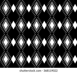 vector illustration. Seamless black and white pattern of rhombus and lines.