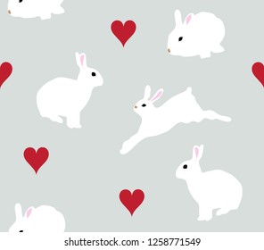 vector illustration of seamless bunnies with red hearts background.