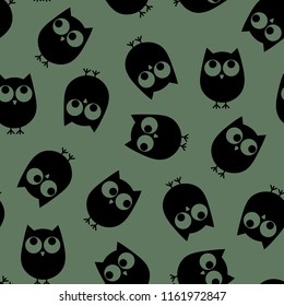Vector illustration. Seamless cute pattern. Owls on the khaki background.