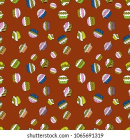 Vector illustration. Seamless of hand drawn vintage cute cupcakes and muffins. Nice birthday pattern on brown, white, green, black and pink. Cupcake pattern.