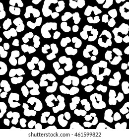 Vector illustration Seamless hand drawn ink splatter ornamental pattern leopard print. Black and white