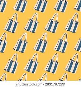 Vector illustration seamless pattern of blue striped canvas tote bags on bright yellow background. Repeating summer vacation wallpaper with nautical beach shopping bags.