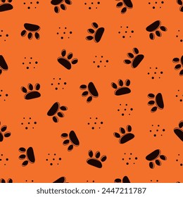  Vector illustration of a seamless pattern consisting of silhouettes of animal paws
