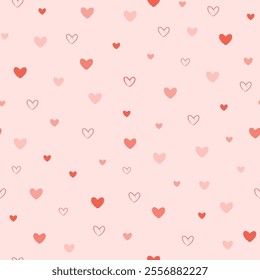 Vector illustration. Seamless pattern of cute red hearts on pink background. Valentine's Day design for fabric, wallpaper, textile, wrapping paper, delicate children's background, website banner backg